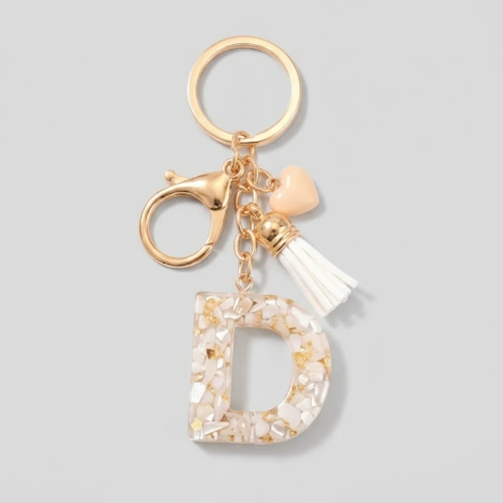 Porte-clés beige avec initiales, lettre D
