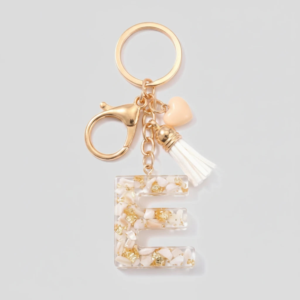 Porte-clés beige avec initiales, lettre E