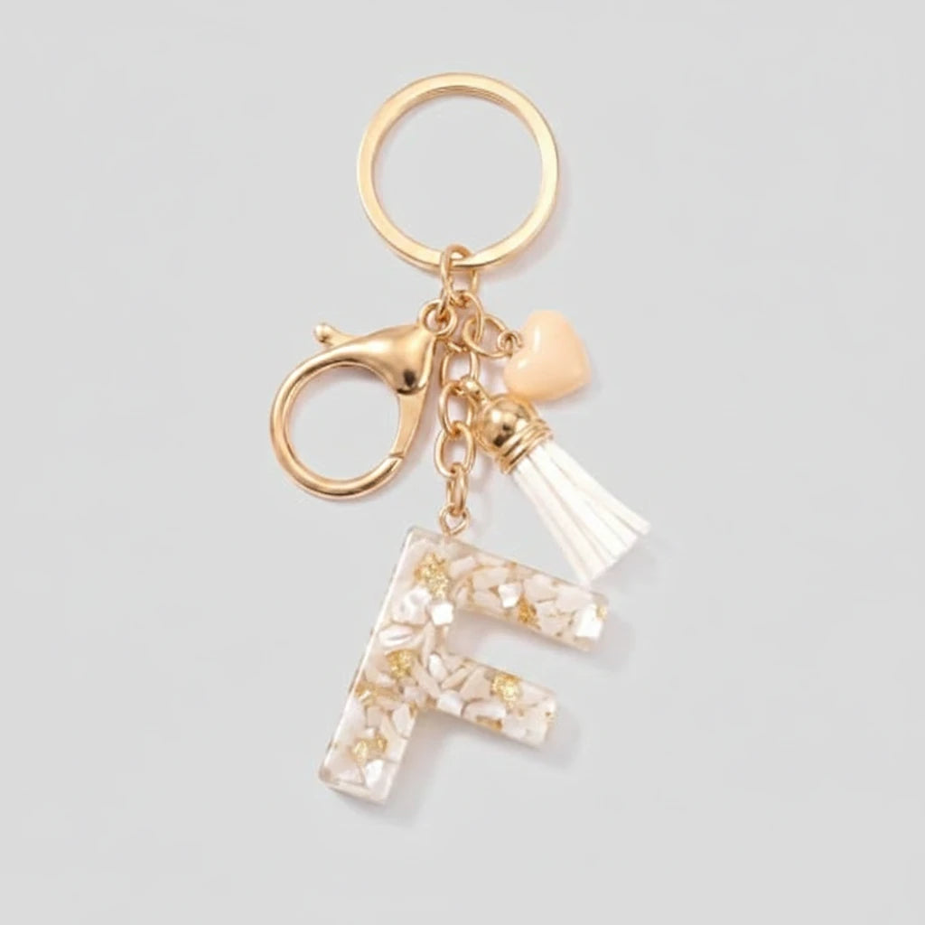Porte-clés beige avec initiales, lettre F