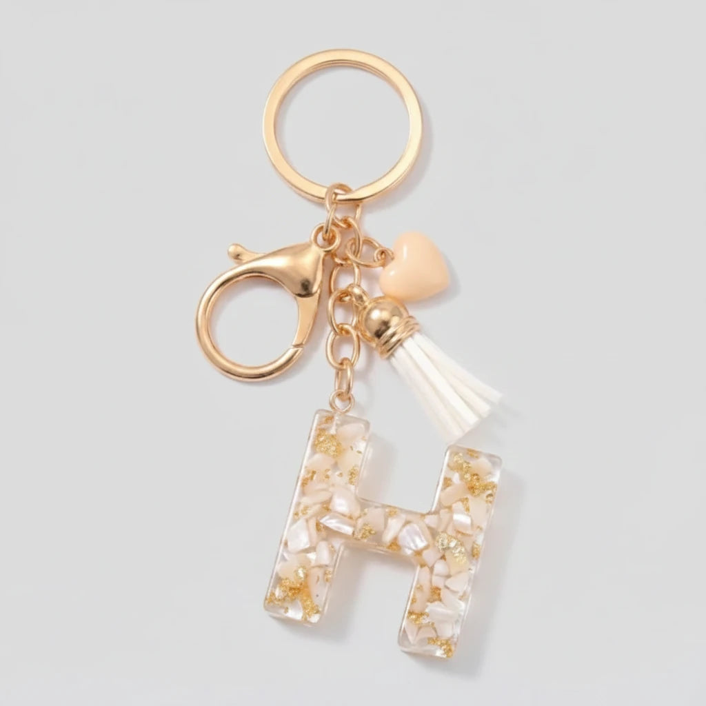 Porte-clés beige avec initiales, lettre H
