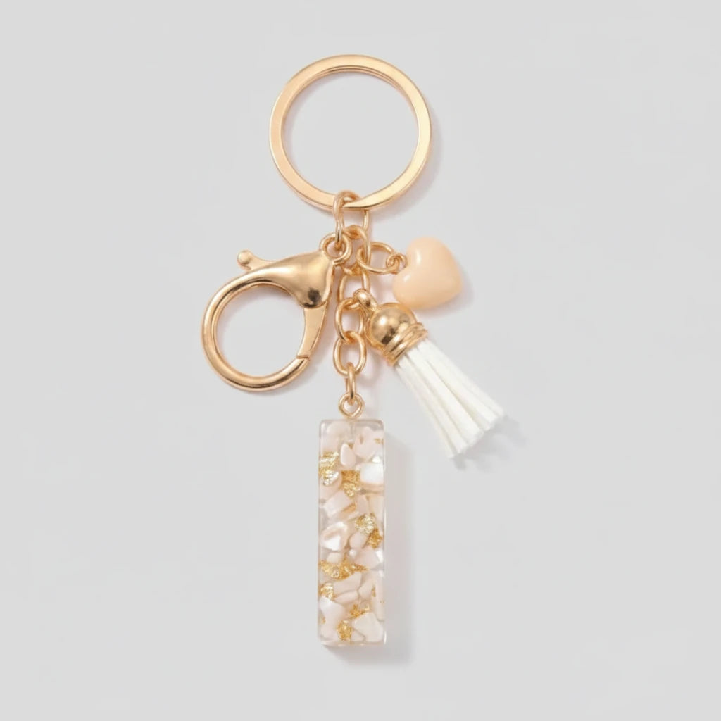 Porte-clés beige avec initiales, lettre I