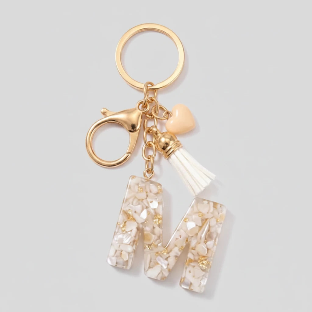 Porte-clés beige avec initiales, lettre M