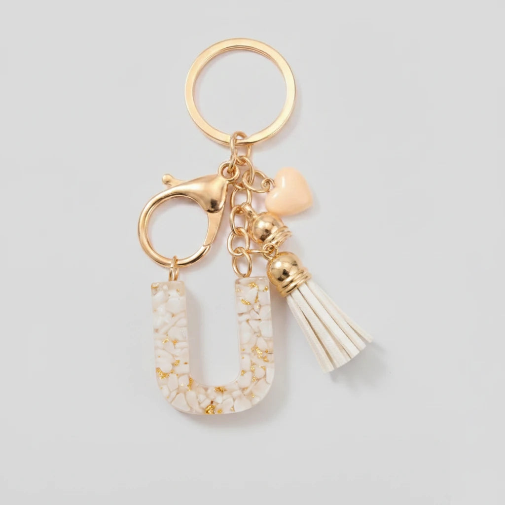 Porte-clés beige avec initiales, lettre U