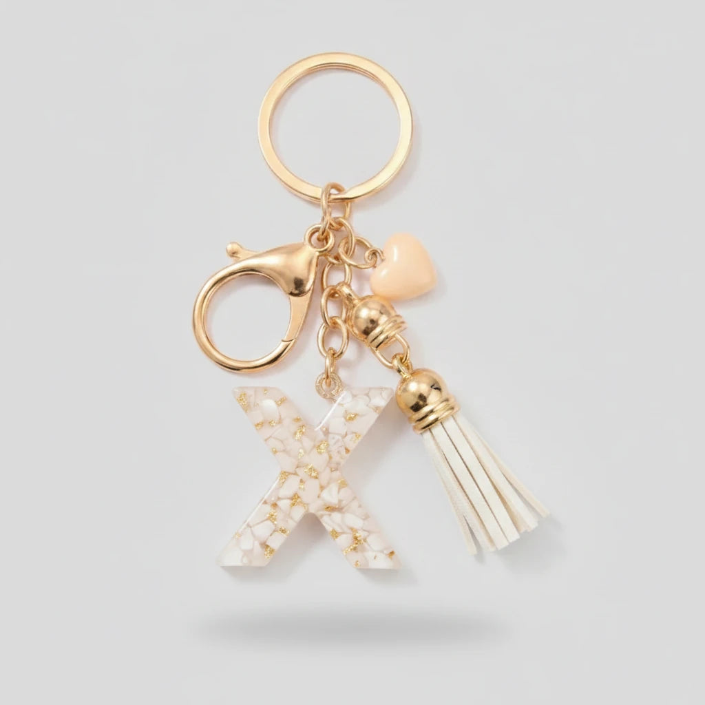Porte-clés beige avec initiales, lettre X